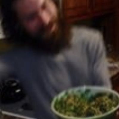 alone laughing with salad