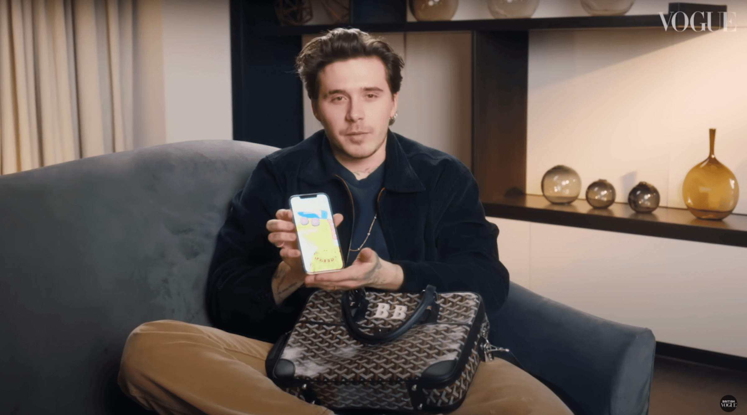 Brooklyn Beckham showcasing his Creepz screensaver in an interview with Vogue