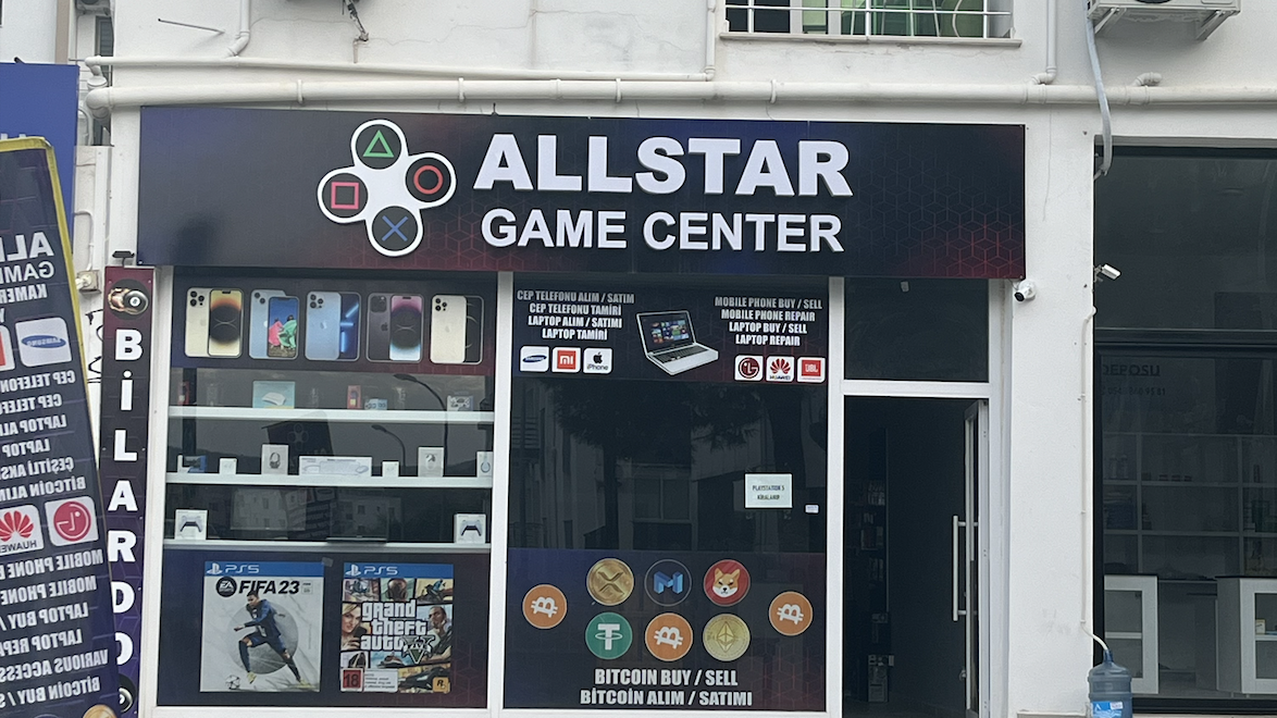 A Game Center but it also supports stable coin exchange with local currencies