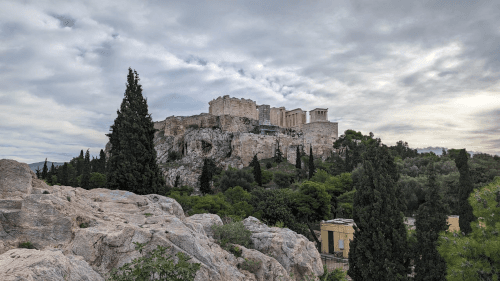 View of the Temple of Poseidon atop a hill on the south coast of Greece 