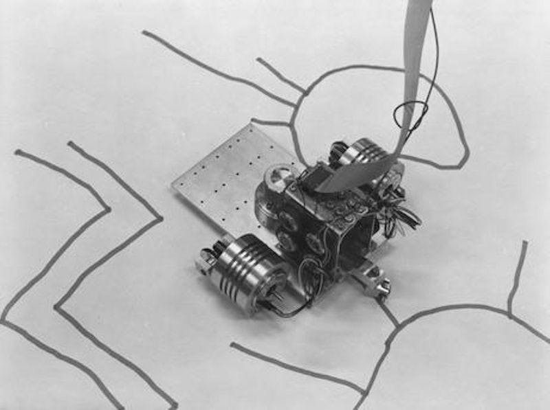 AARON, a drawing "turtle", was a small robot equipped with a marker
