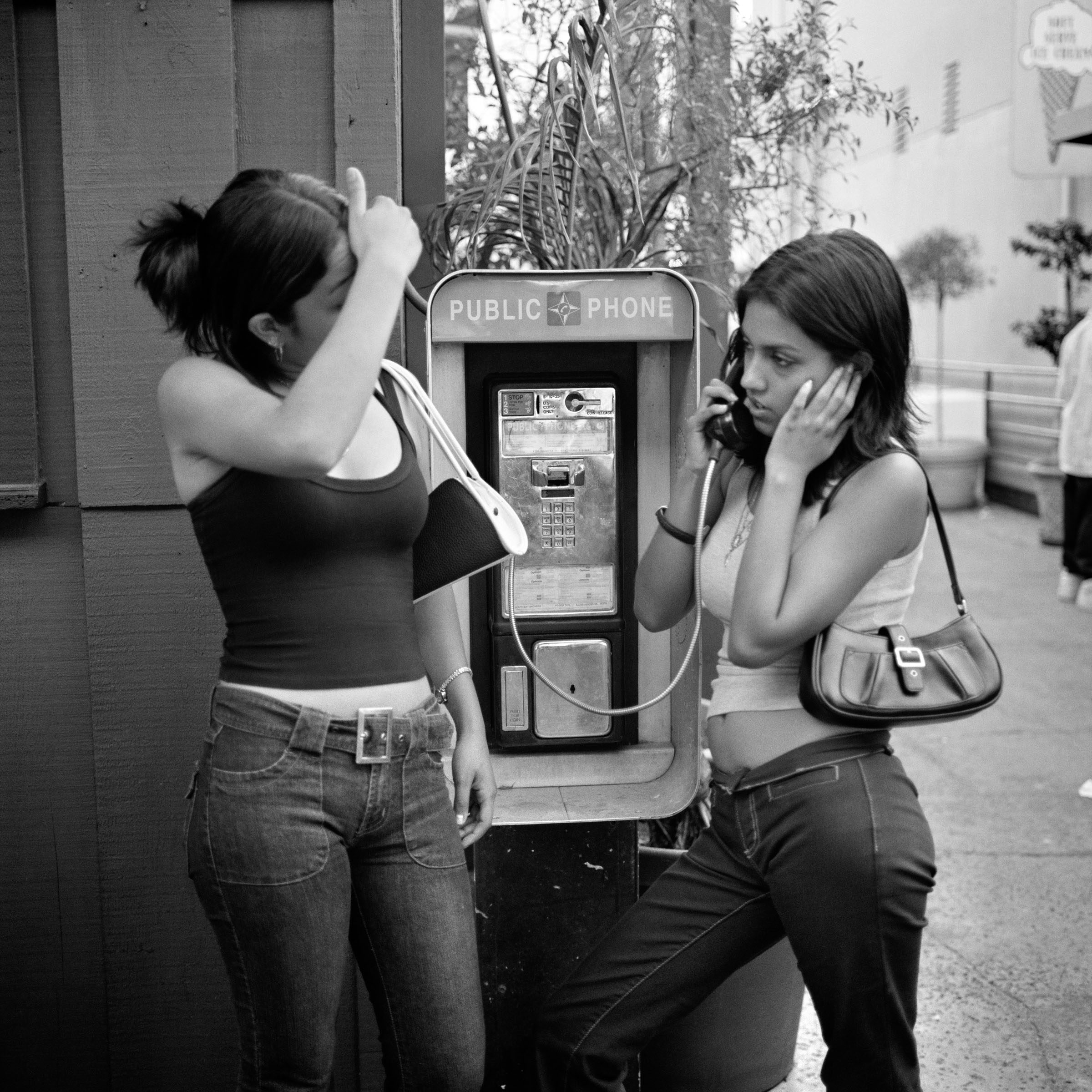 THE VILLAGE #29 TEEN GIRLS ON A PAYPHONE by Deanna Templeton, Obscura Curated Commission