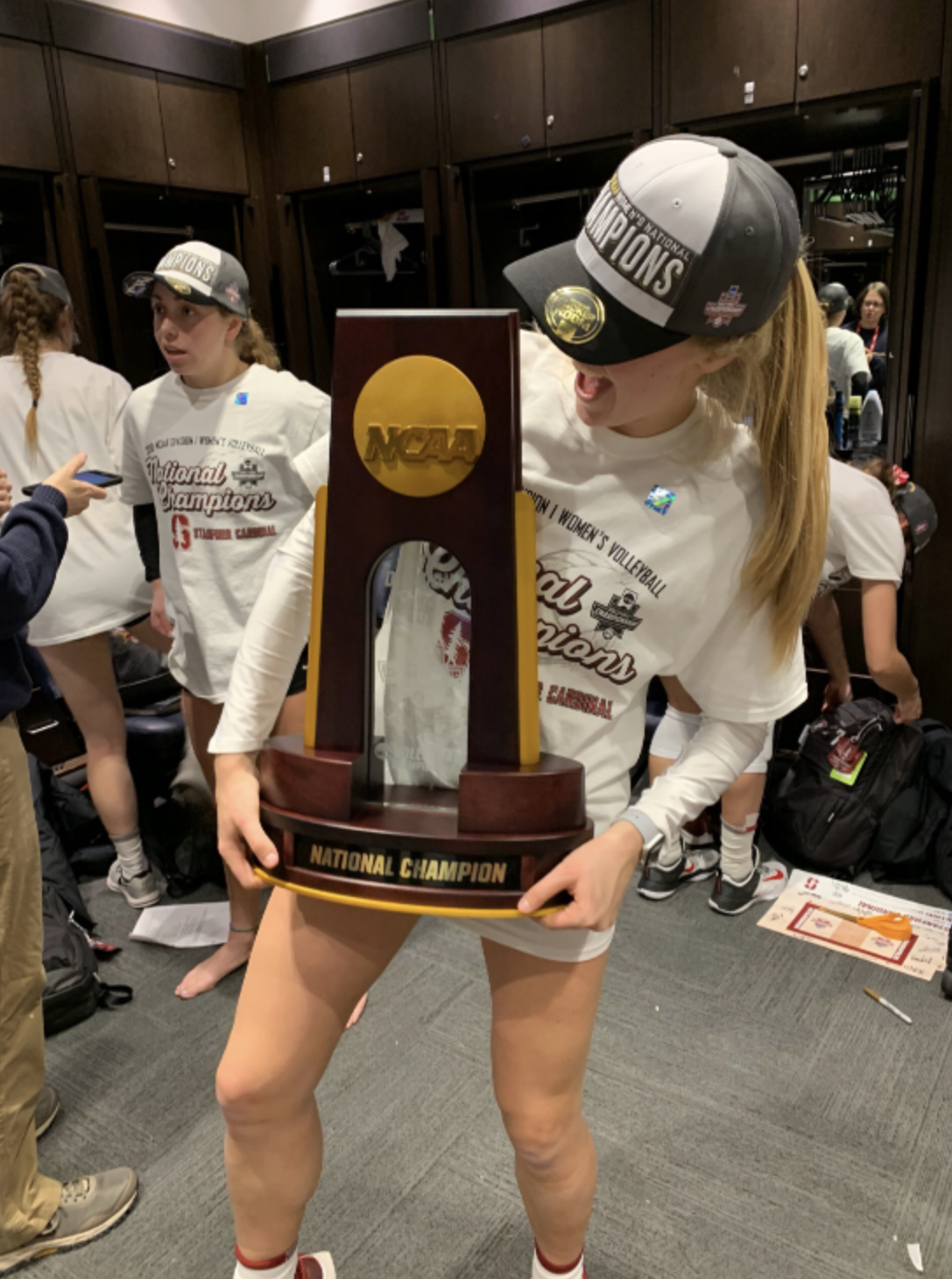 Holding the trophy after winning the indoor national championship in 2019.