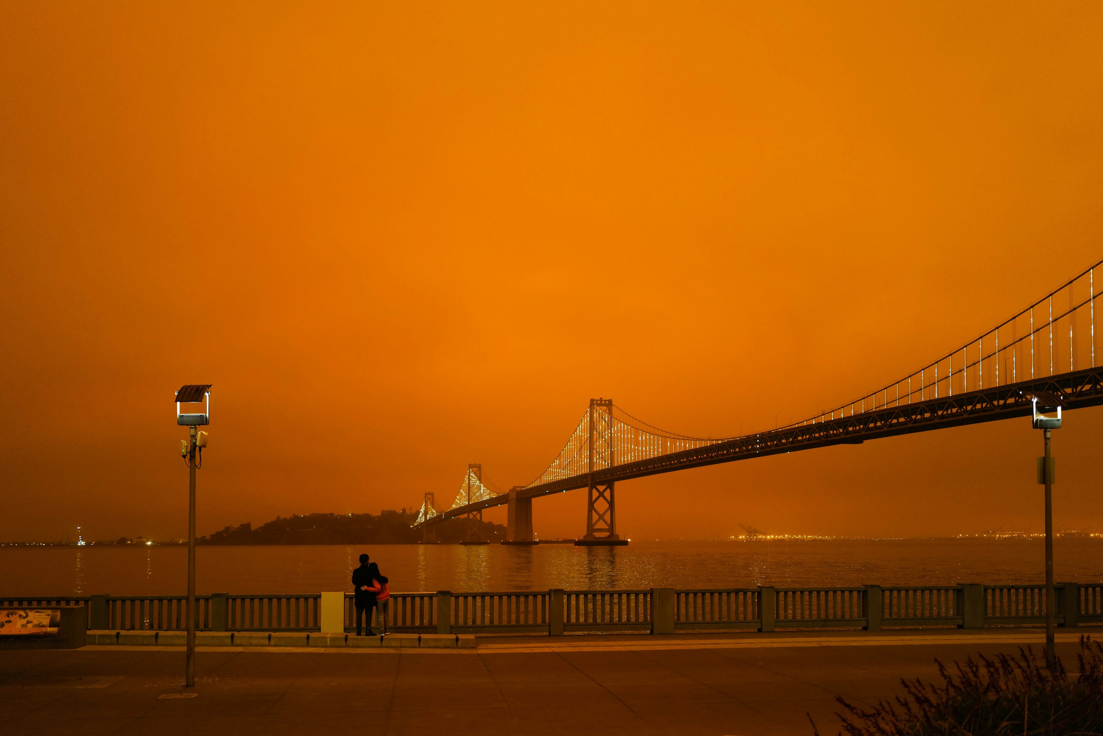Orange sky over the San Francisco Bay Bridge due to the west coast wildfires.  Photo by Thom Milkovic.