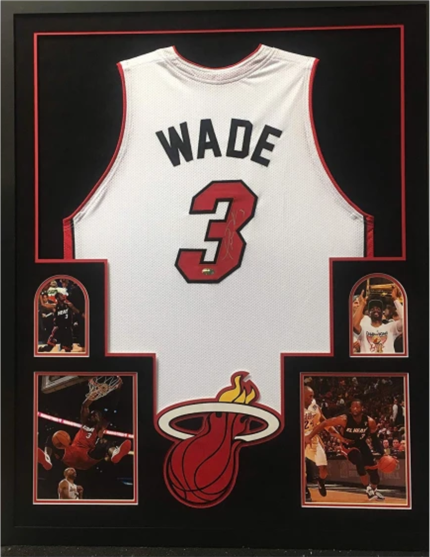 Pictured: An example of framed Miami Heat sports memorabilia 