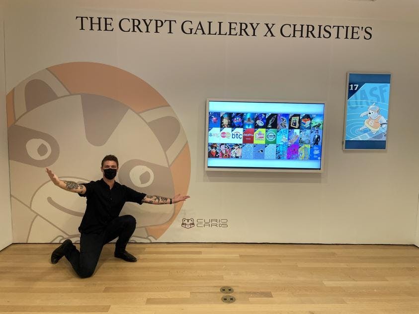 Curio Cards displayed at the Christie’s Auction in 2021, curated by The Crypt Gallery. Image via @nonfungiblenoah: https://twitter.com/NonFungibleNoah/status/1441892058554318852.