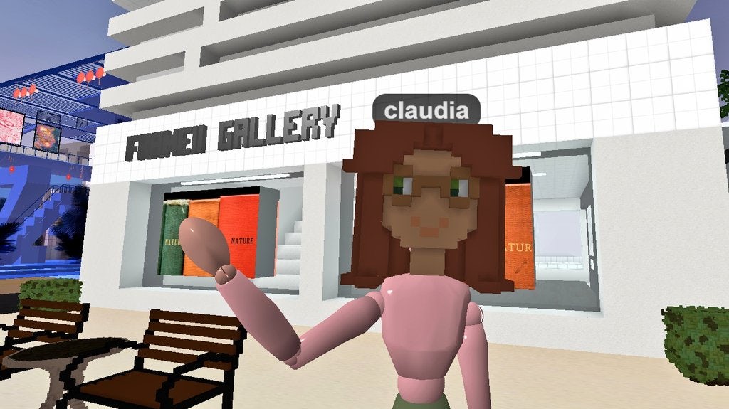 Claudia outside her space, Frame11 Gallery in Cryptovoxels.
