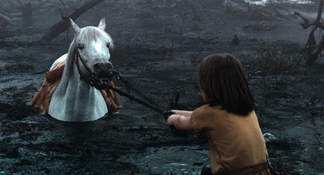 Atreyu, desperate to save Artax, his beloved steed, in The NeverEnding Story (1984)