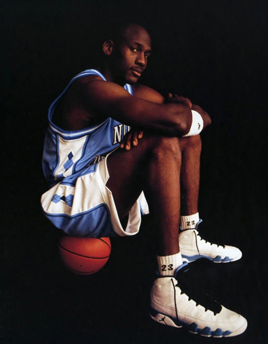 Pictured: Michael Jordan wearing the first PE Air Jordan IXs in 1994