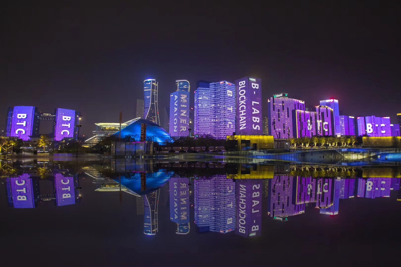20th Nov. light show showing “BTC”, “Blockchain”, “Miner” was in Hangzhou, China. The building at most left with BTC on it, where Hangzhou city government sits. On 21st Nov., the Hangzhou-based bitcoin mining giant Canaan is listed on NASDAQ.