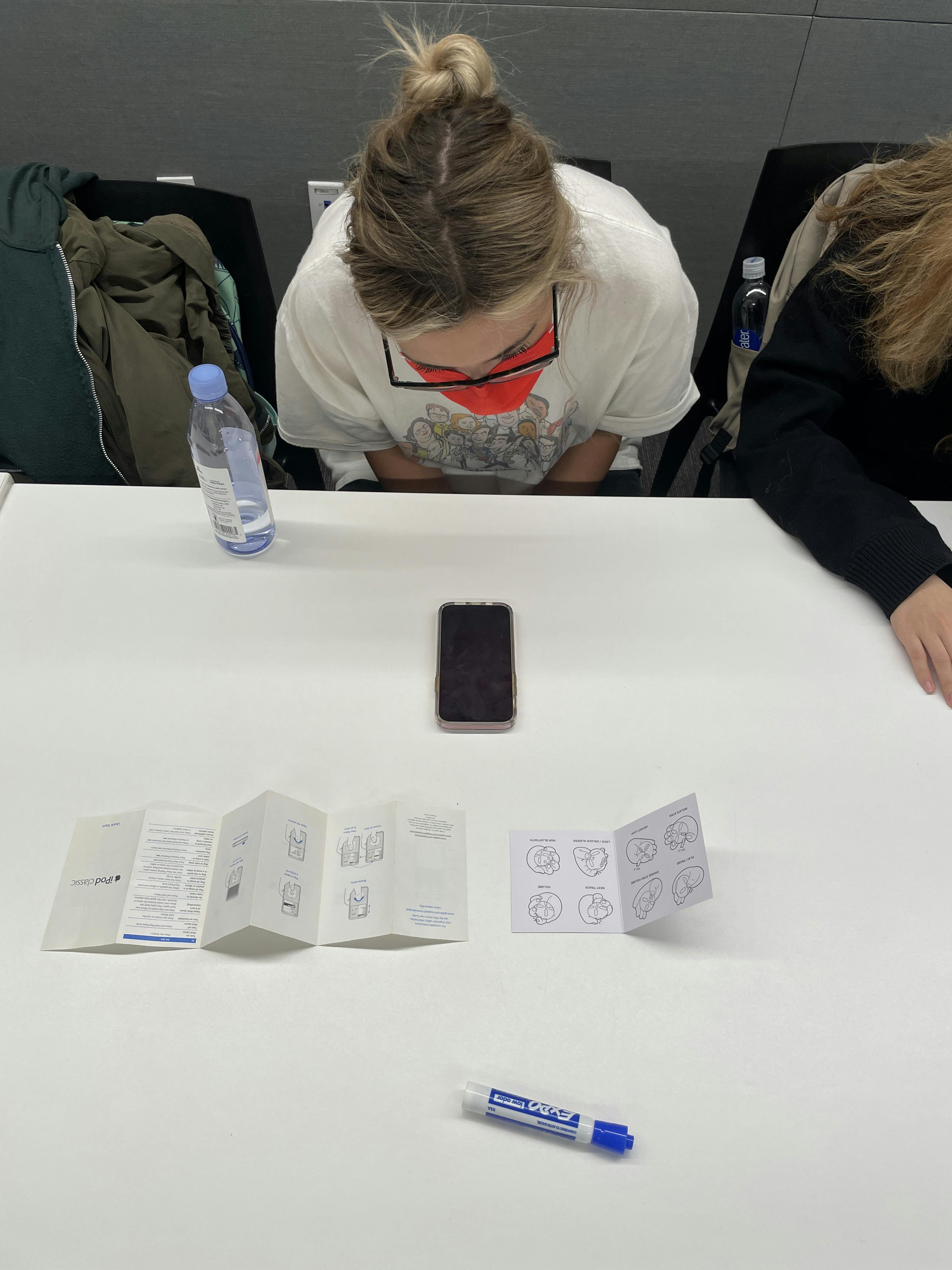 Users comparing the instructions for the iPod and the STEM player