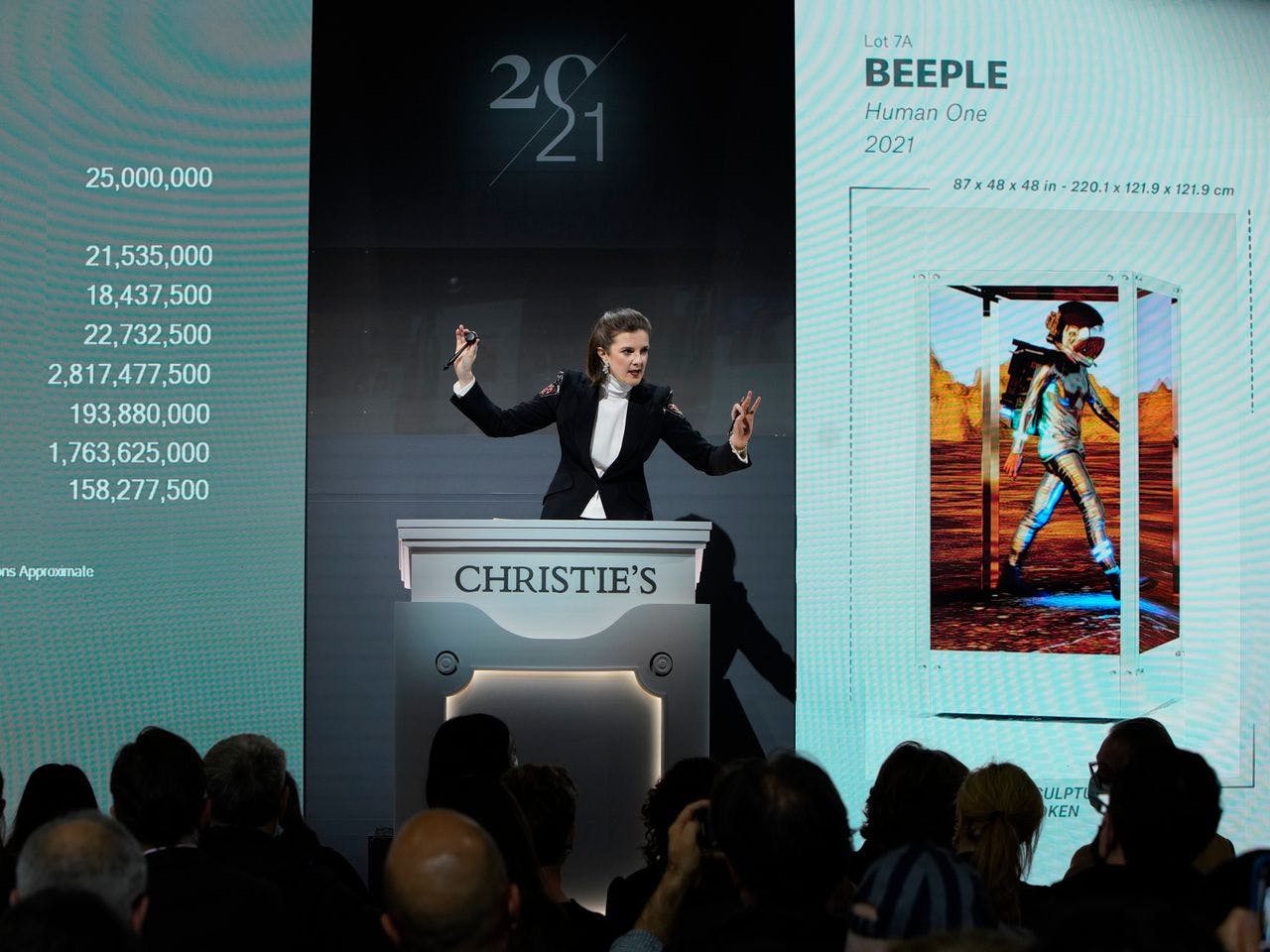 Beeple’s Human One, the second landmark NFT sale for Christie’s, and the artist. Image from: https://www.wsj.com/articles/how-christies-is-pitching-its-expansion-from-picassos-to-nfts-11637700438